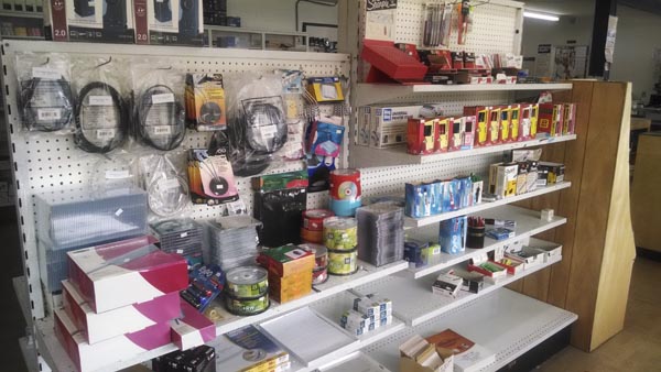 Store shelf displays featuring tech gear lines